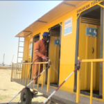 Toilet cleaning at construction site